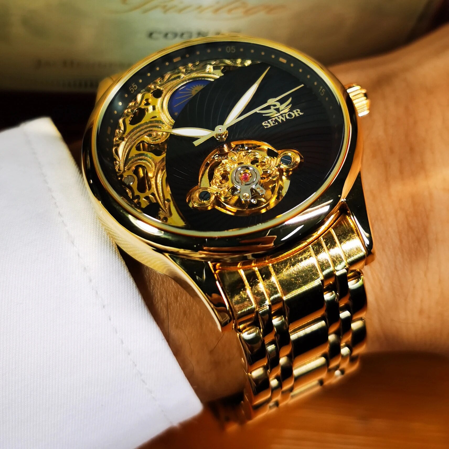 Luxury Stainless Steel Strap Moon Phase Tourbillon Automatic Mechanical Watch with Gold Skeleton Design and Luminous Hands